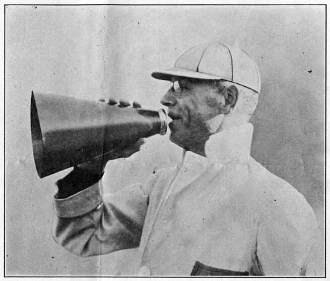 John Heisman yells into a megaphone while coaching Penn