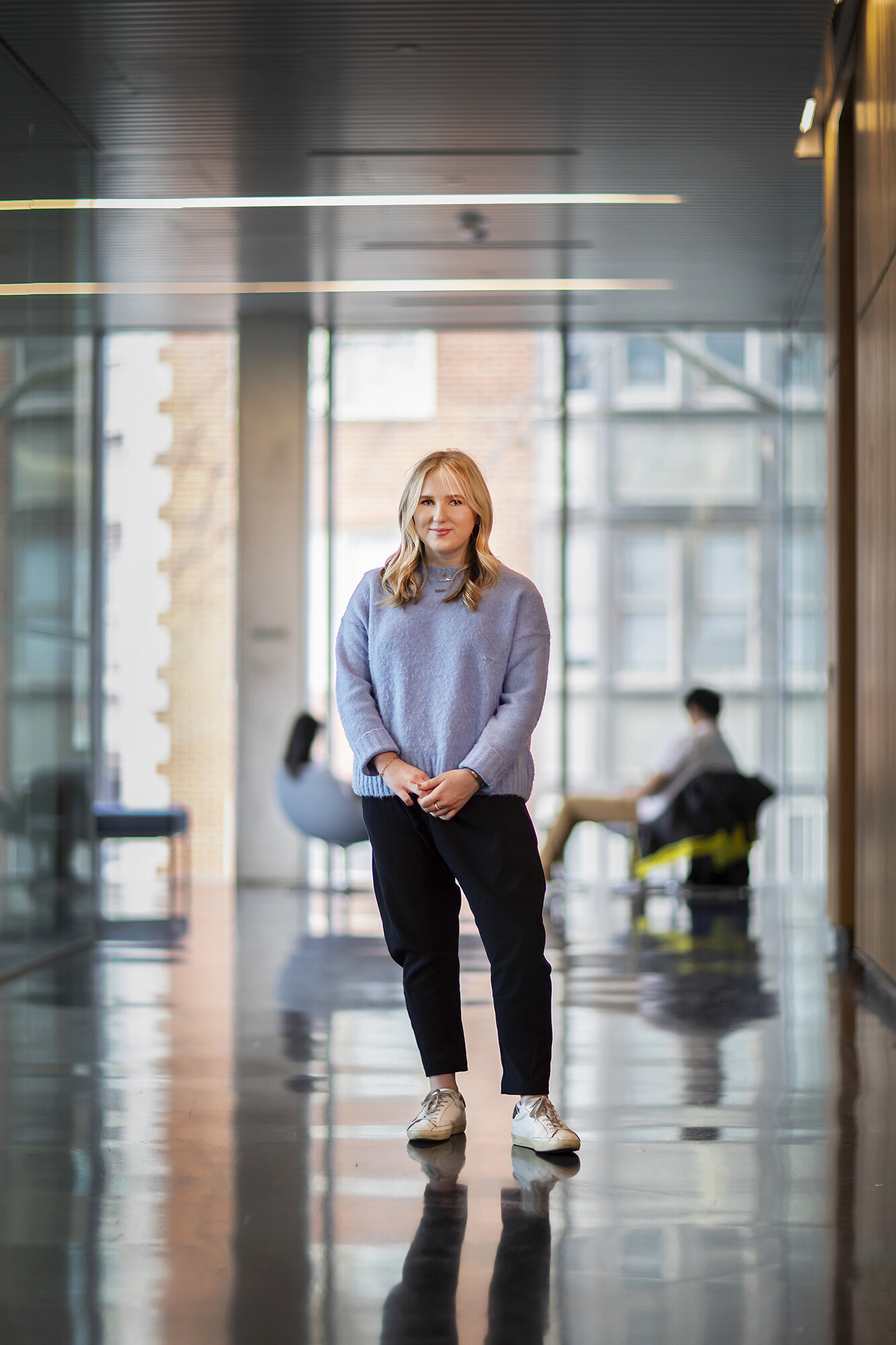 Student standing in hallway.
