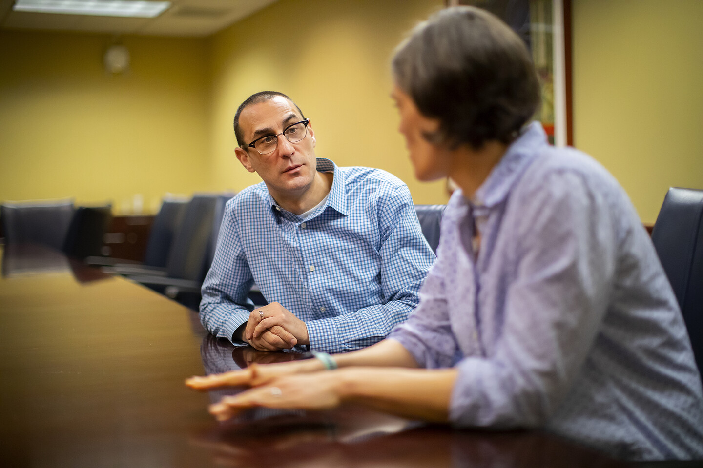 Robert Schnoll talking in a conference room