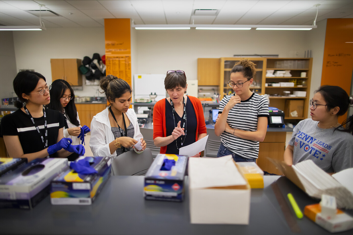 jennifer punt with students in canine lab