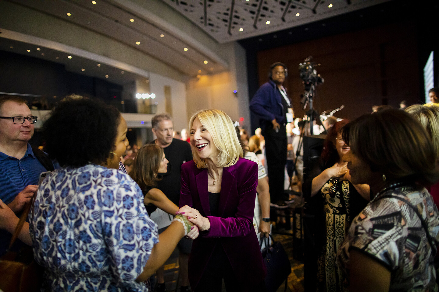 penn president amy gutmann shaking hands at dc book fair