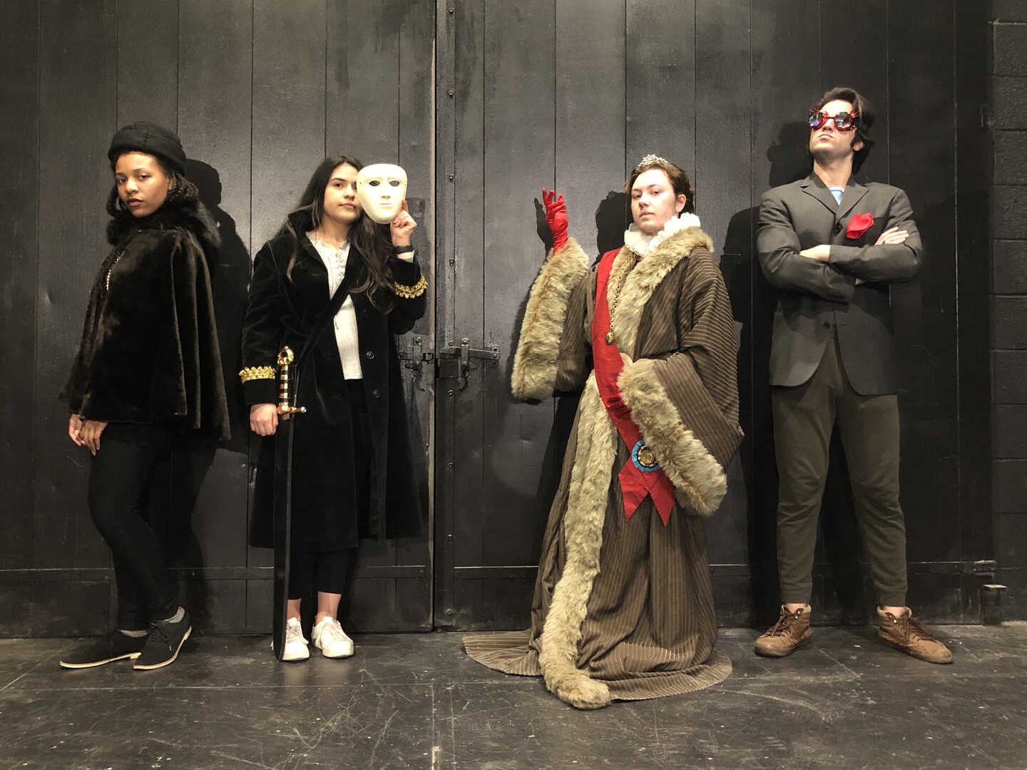 Four students dressed in costume. 