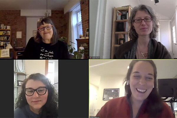 Four people speaking from home each on the computer screen in a videoconference