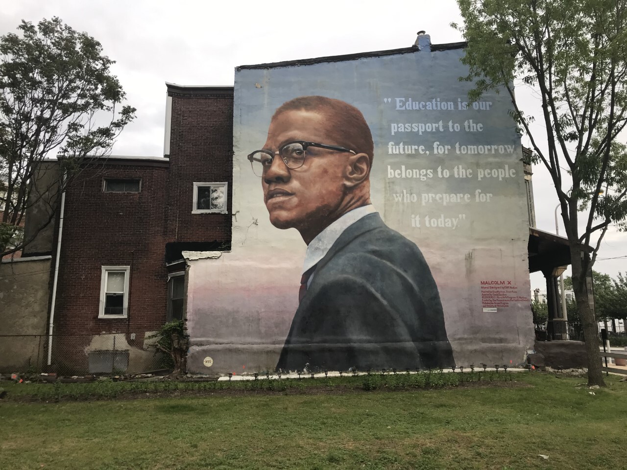 A mural of Malcolm X by former Penn student Ernel Martinez at Diamond Street and Ridge Avenue in Strawberry Mansion.