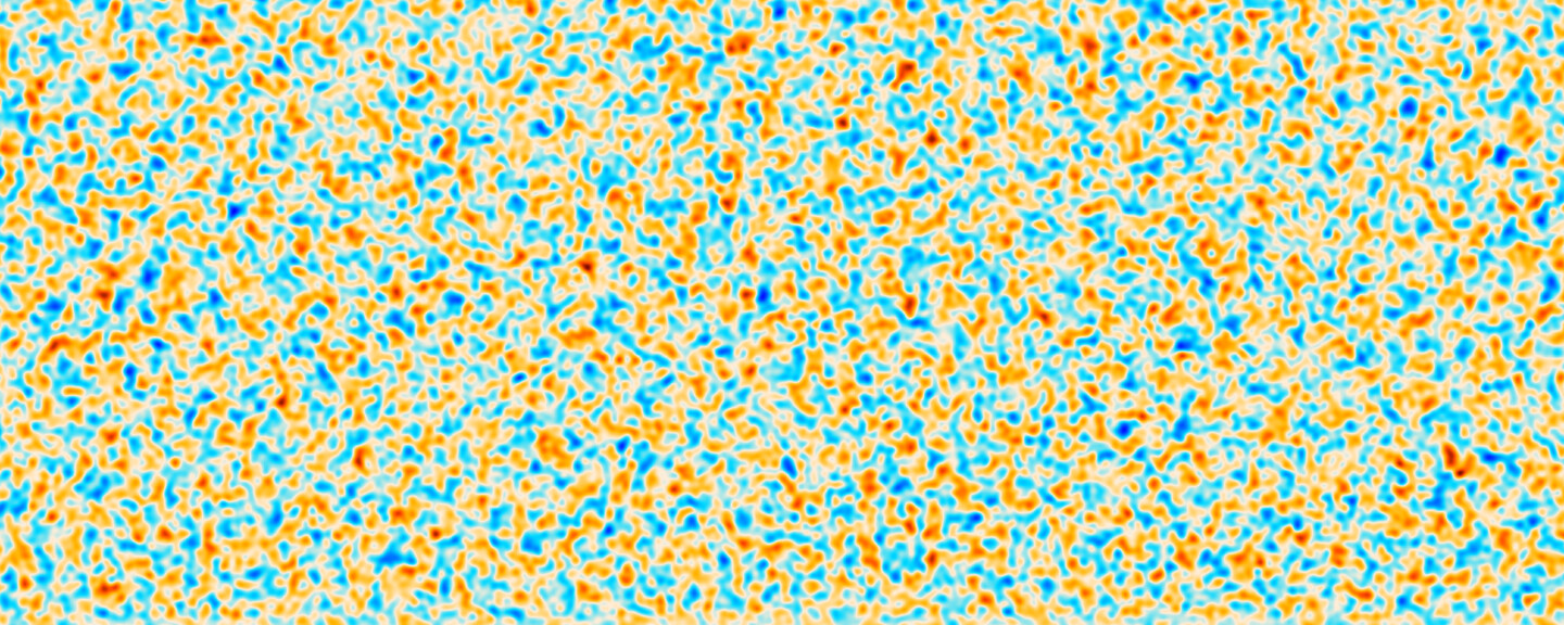 an image of the cosmic microwave background, showing variations in polarization as shades of orange and blue