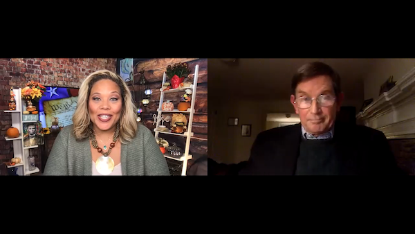 A woman and a man are on a Zoom call.