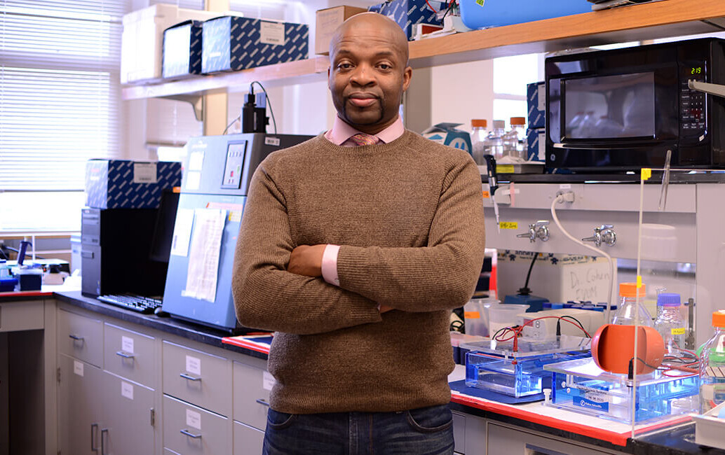De'Broski Herbert poses in his scientific lab
