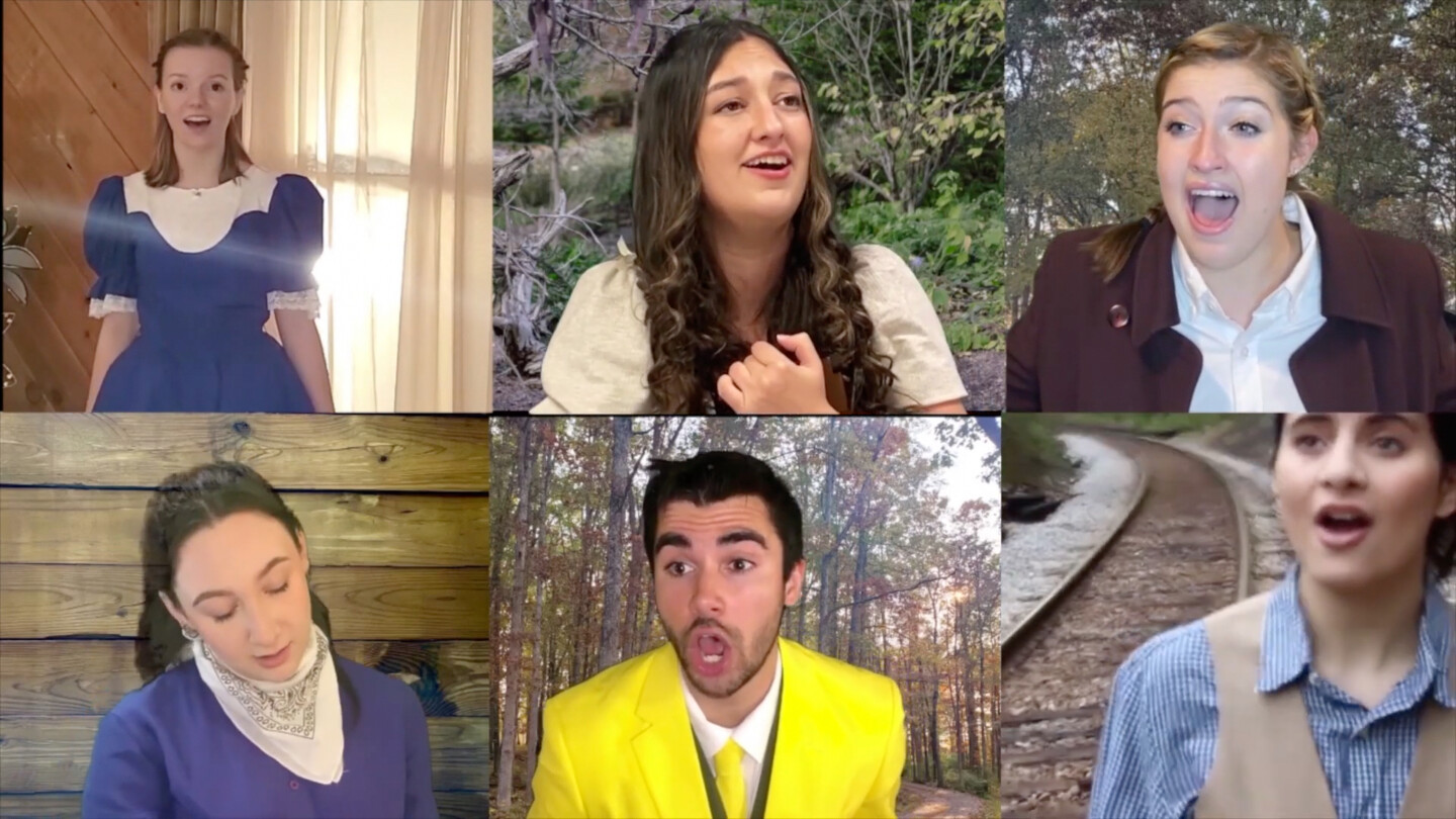 Six students in costume singing 