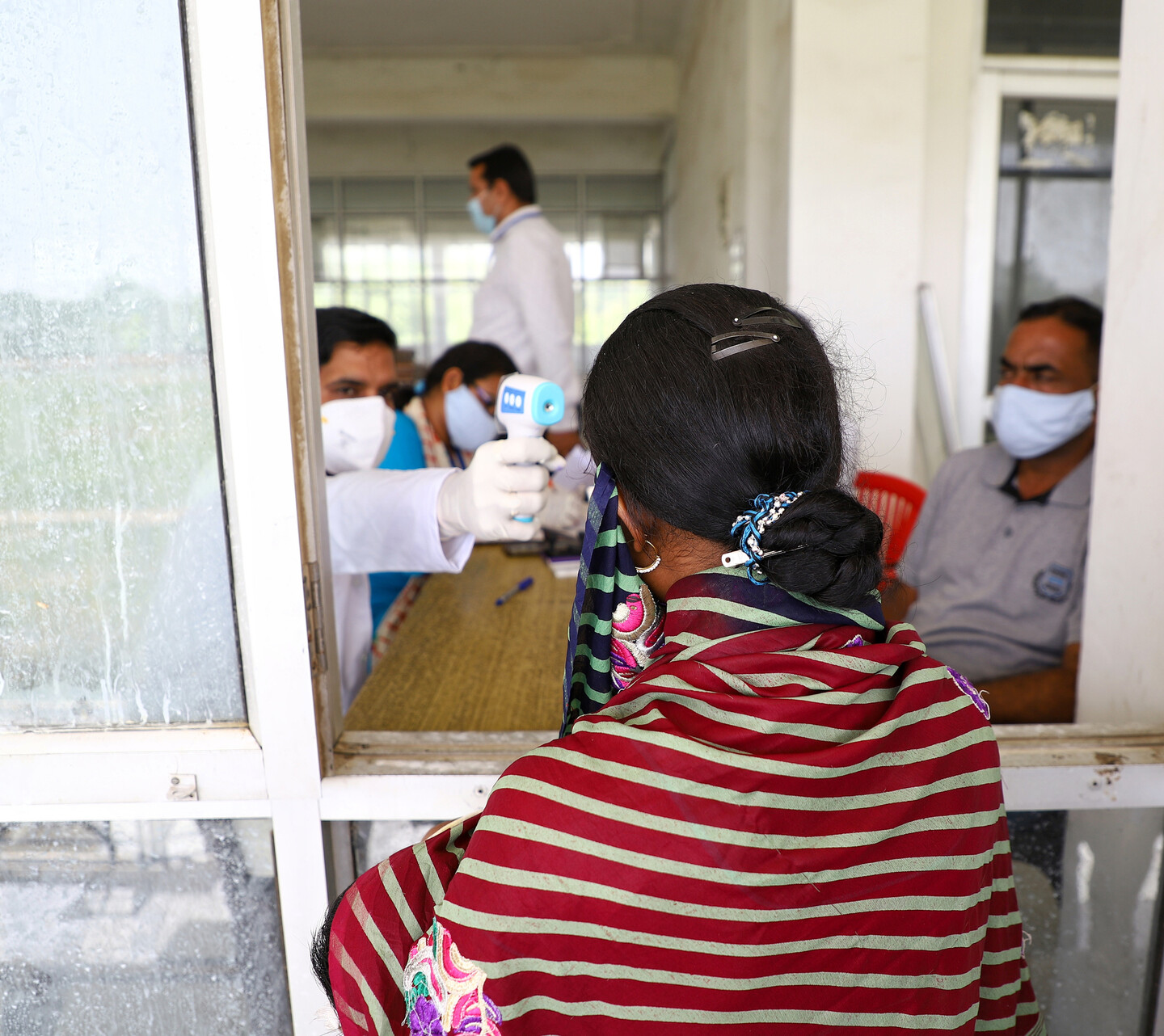patient getting temperature taken
