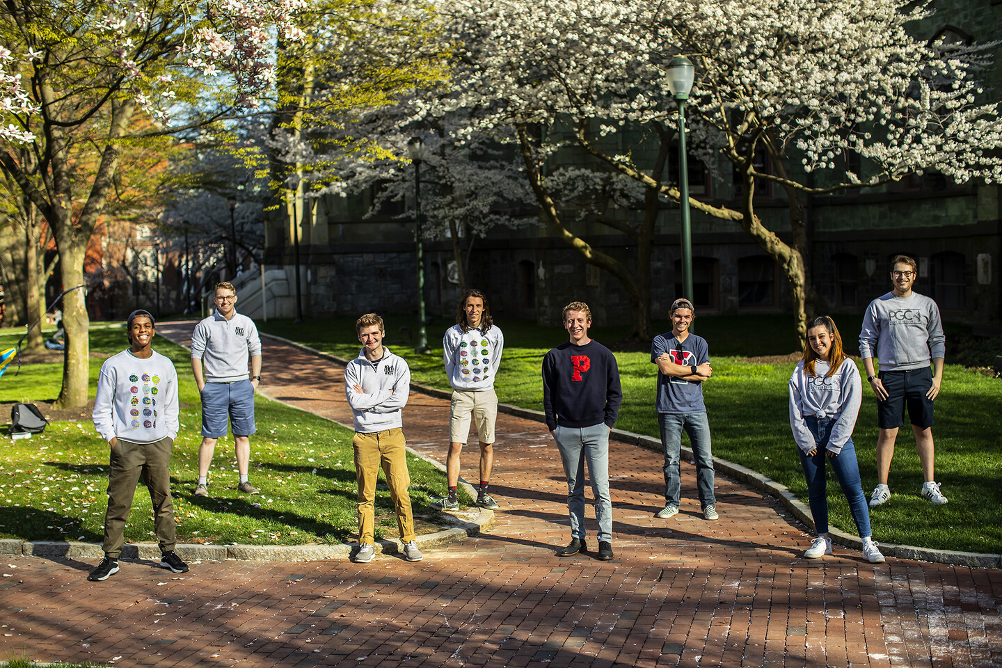 8 students standing outside