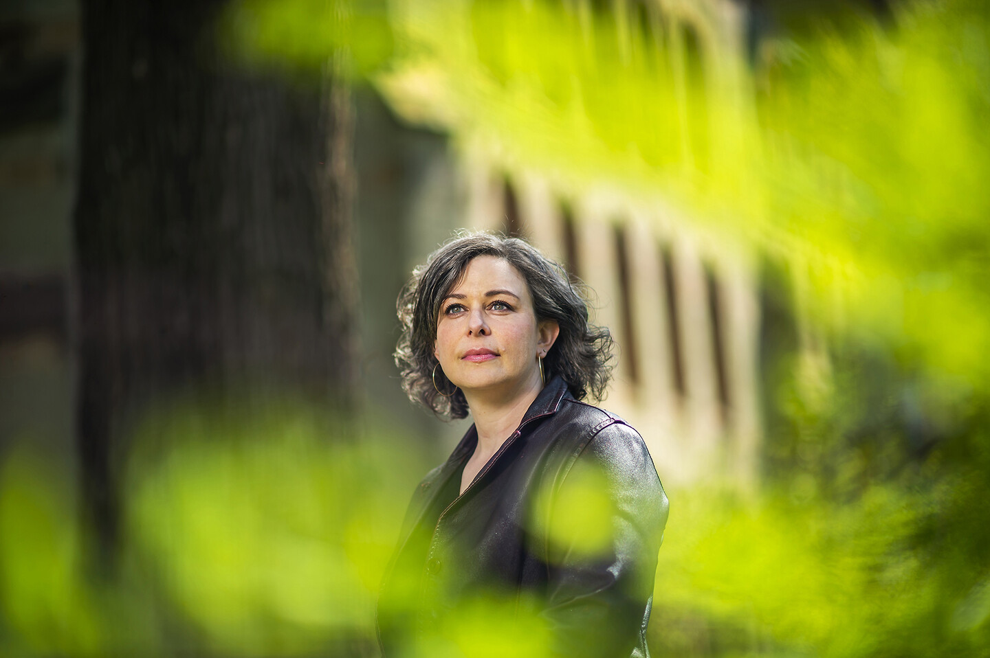 Professor Elly Truitt amid greenery