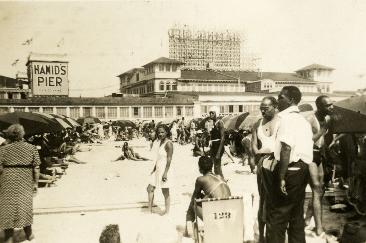 African Americans enjoy themselves on a segregated portion of the Atlantic City, New Jersey, boardwalk and beach, which was derogatorily called “Chicken Bone Beach.”