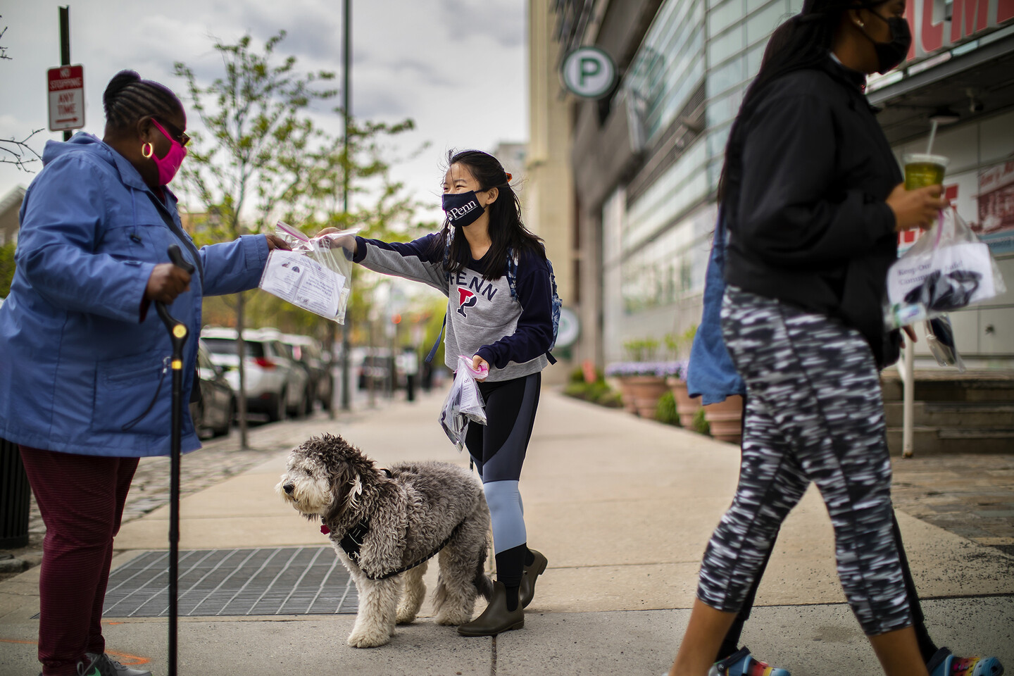 nursing students handing out masks