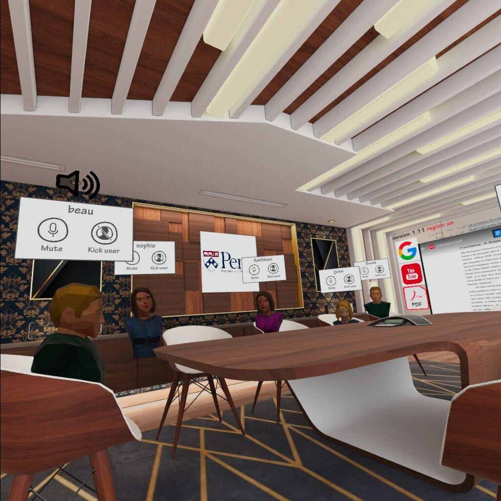 In virtual reality, students' avatars sit around a table with their names above their heads.