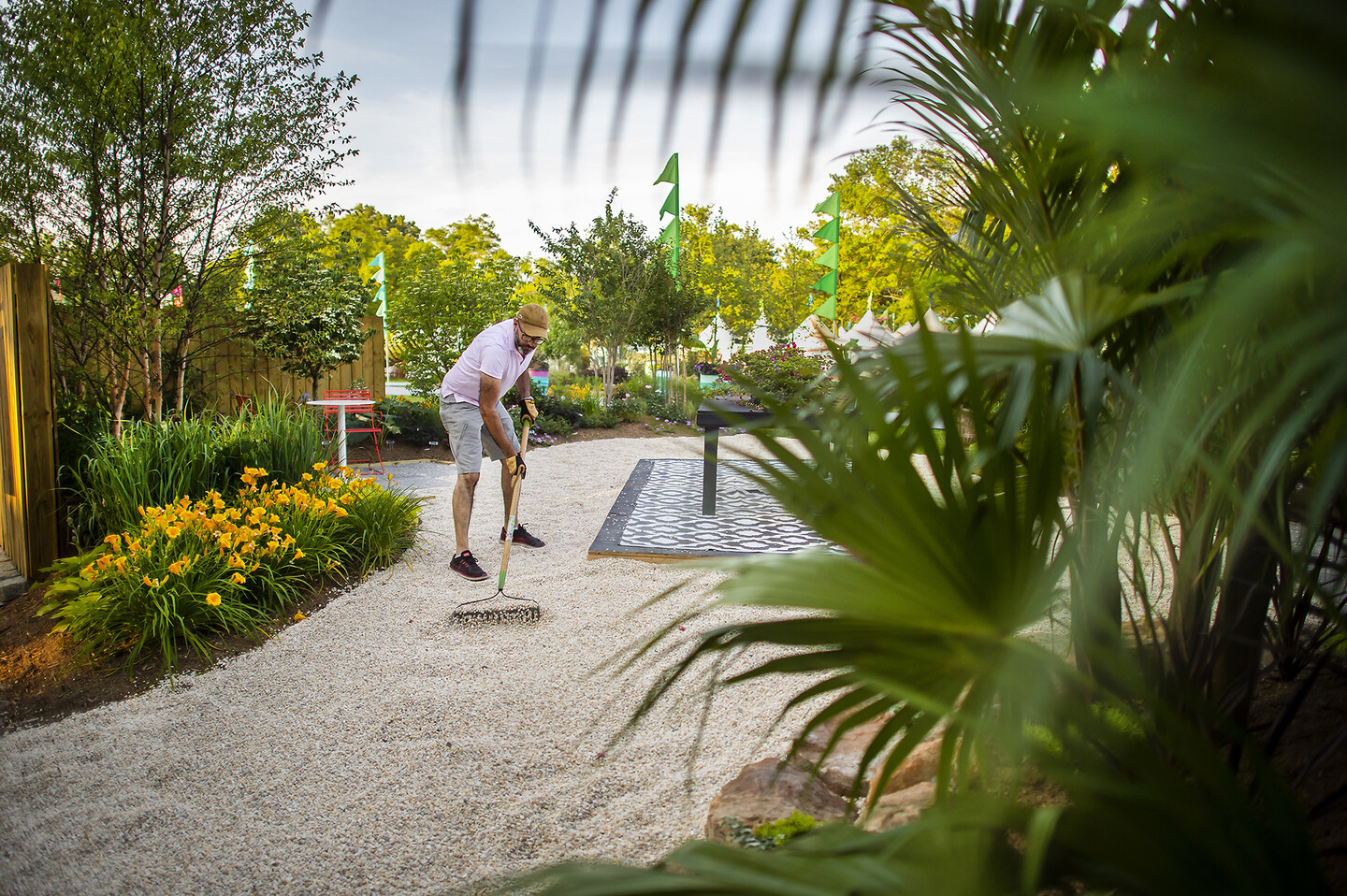Abdullah Tabet raking stones