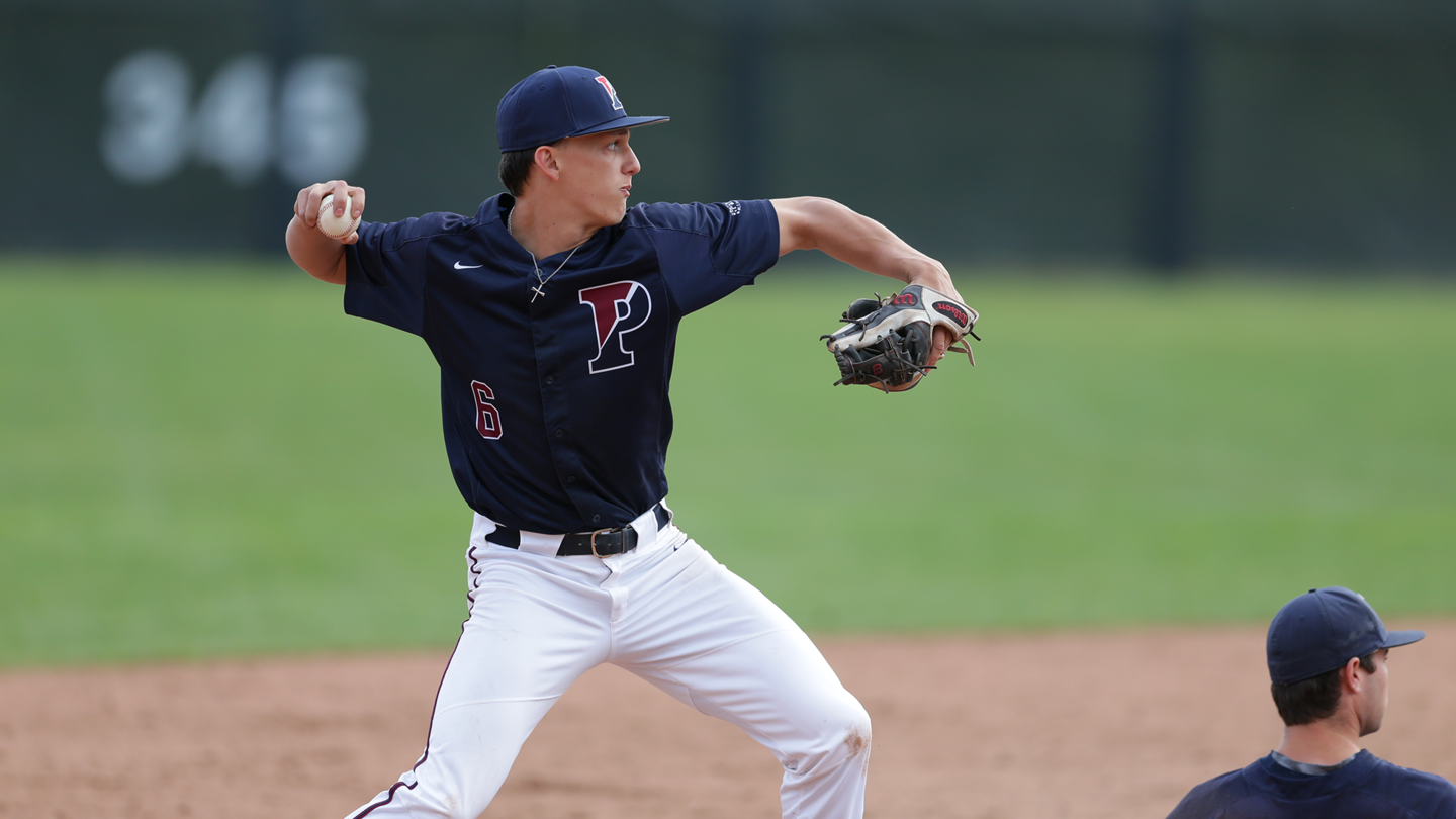 Josh Hood prepares to throw a ball while playing for Penn.