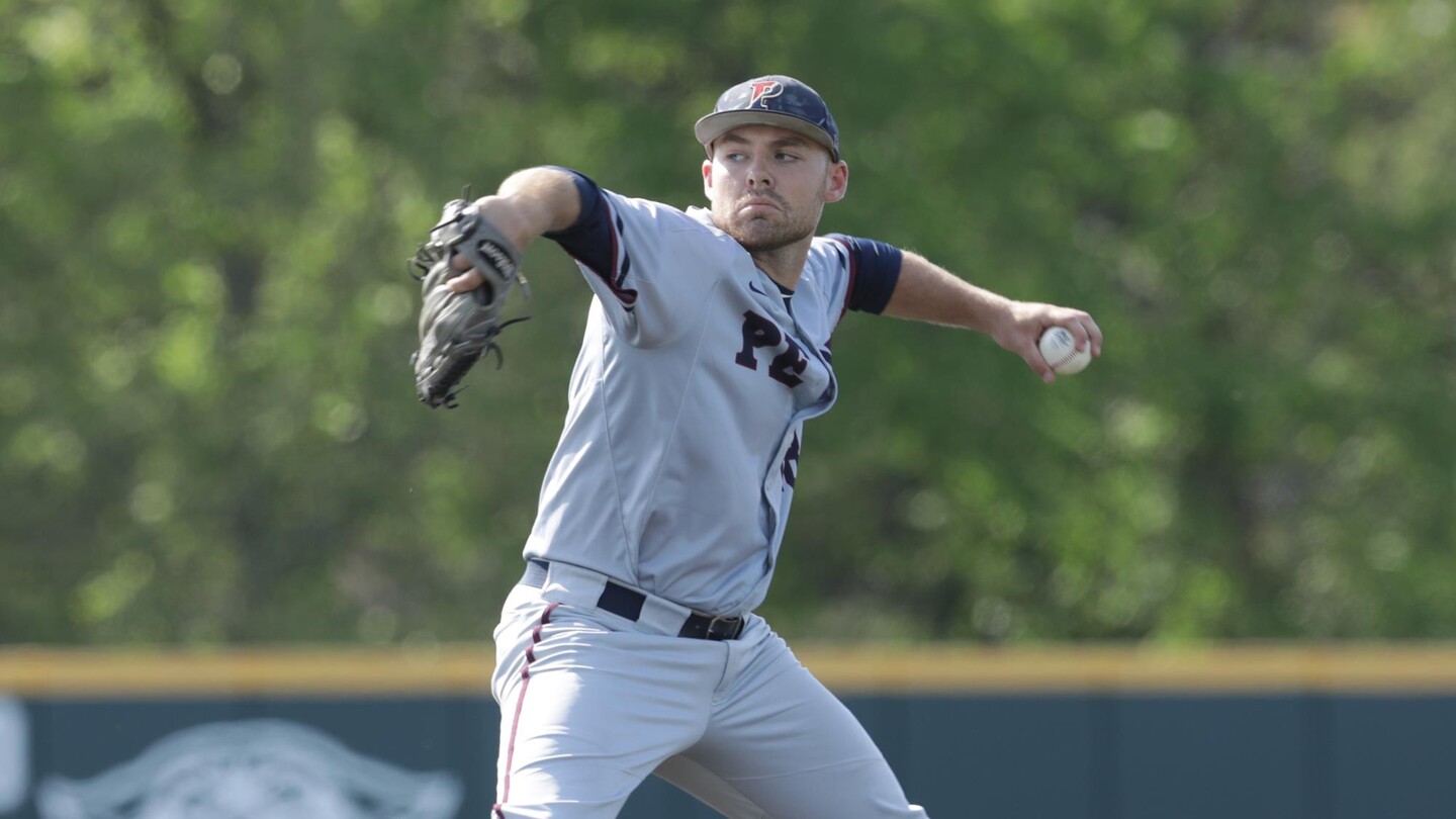 Brendan Bean prepares to throw the ball from the mound during a game.