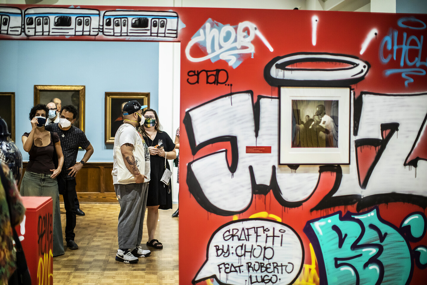 Wall with graffiti and a black and white photo
