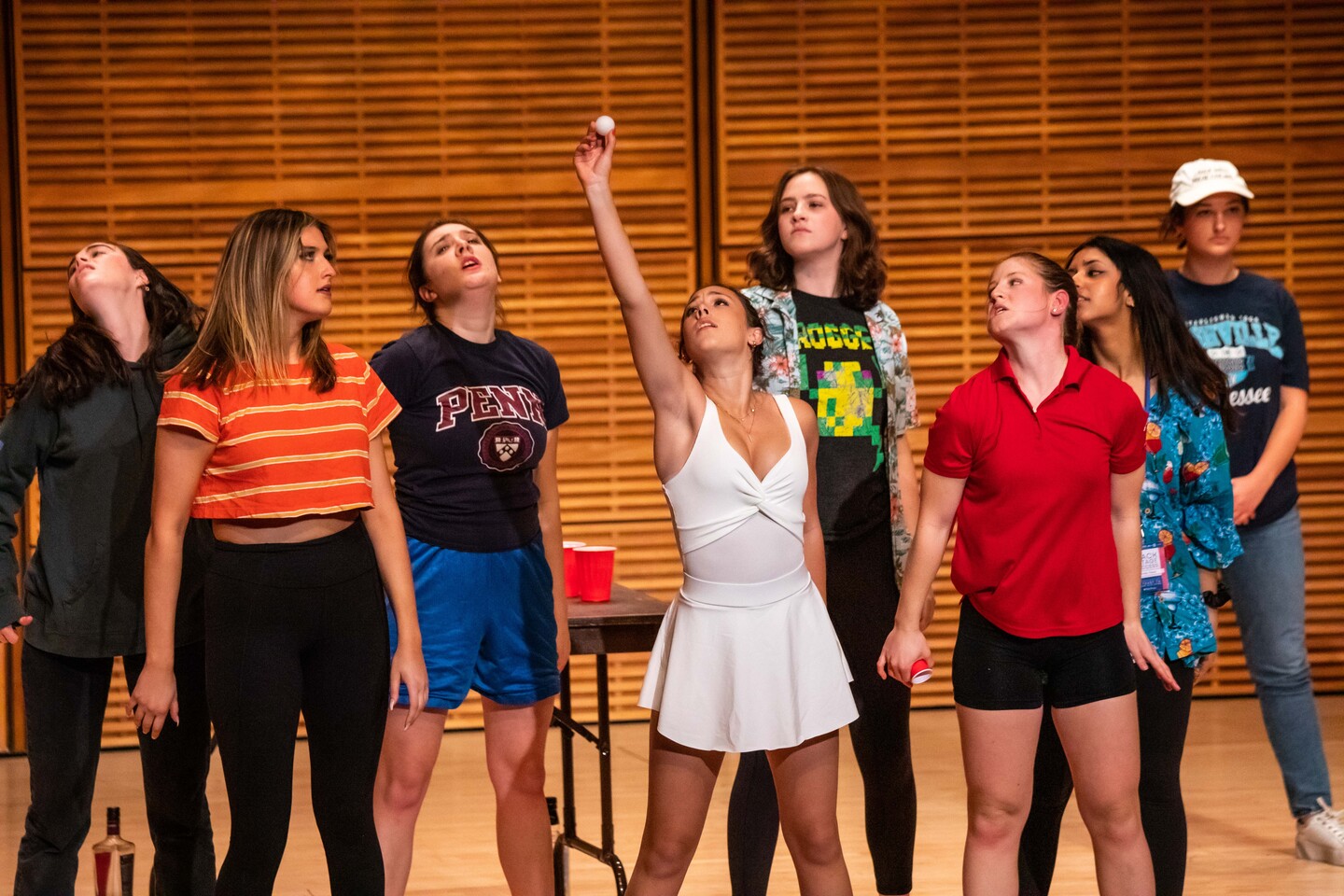 eight students on stage 