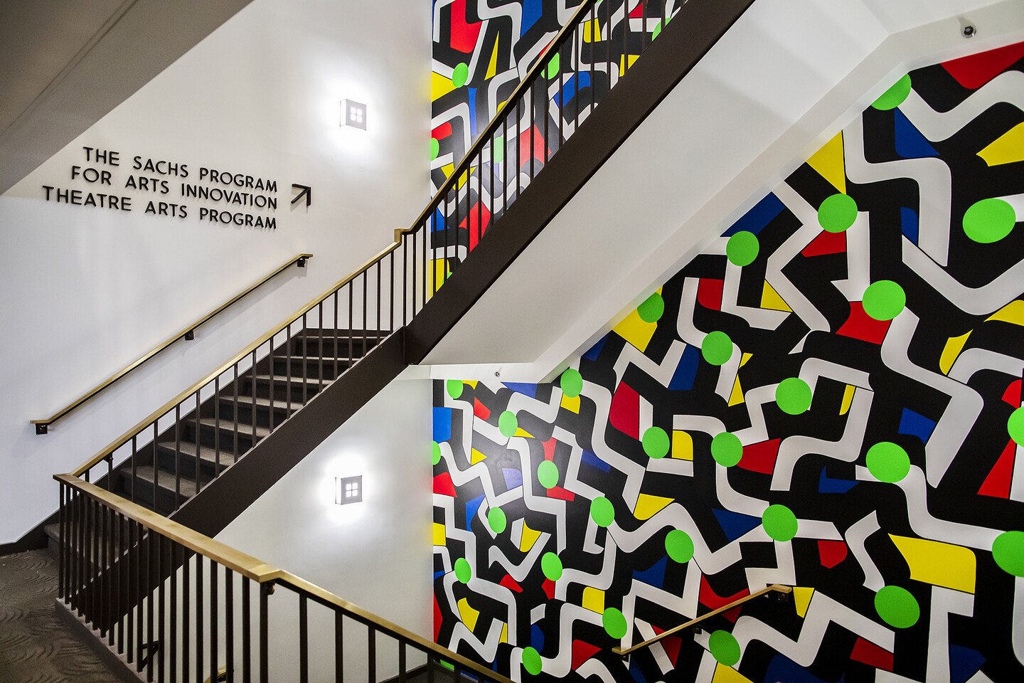 Mural behind staircase 