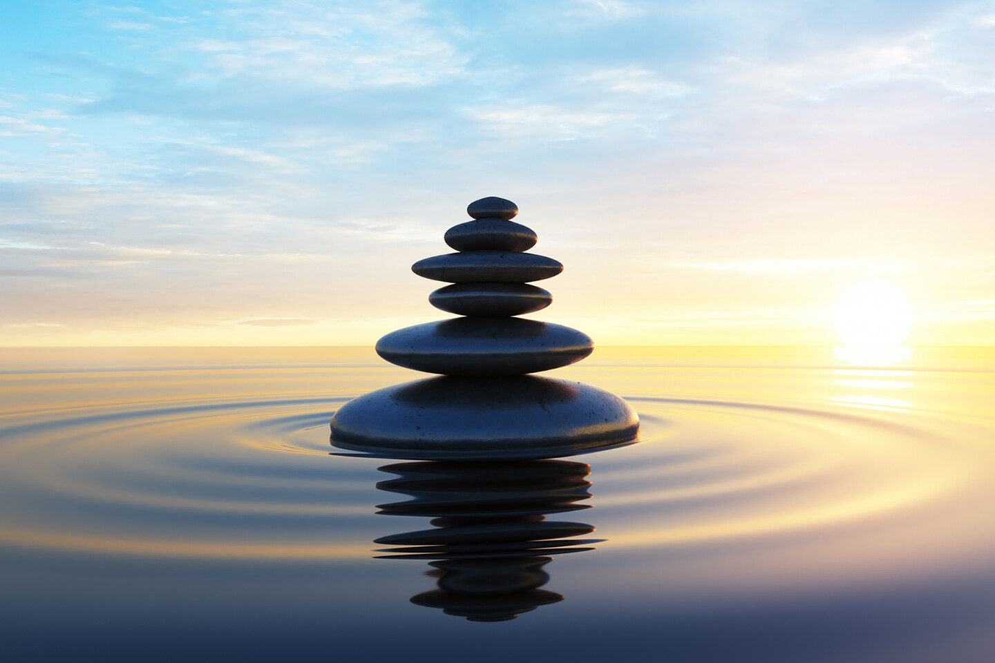 Rocks stacked in water
