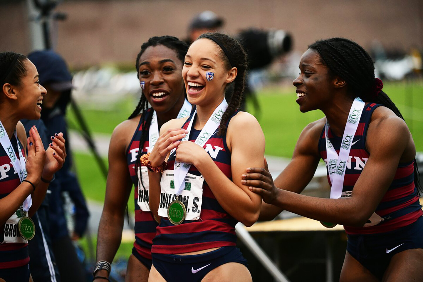 Skyla Wilson celebrates with her teammates after medaling.