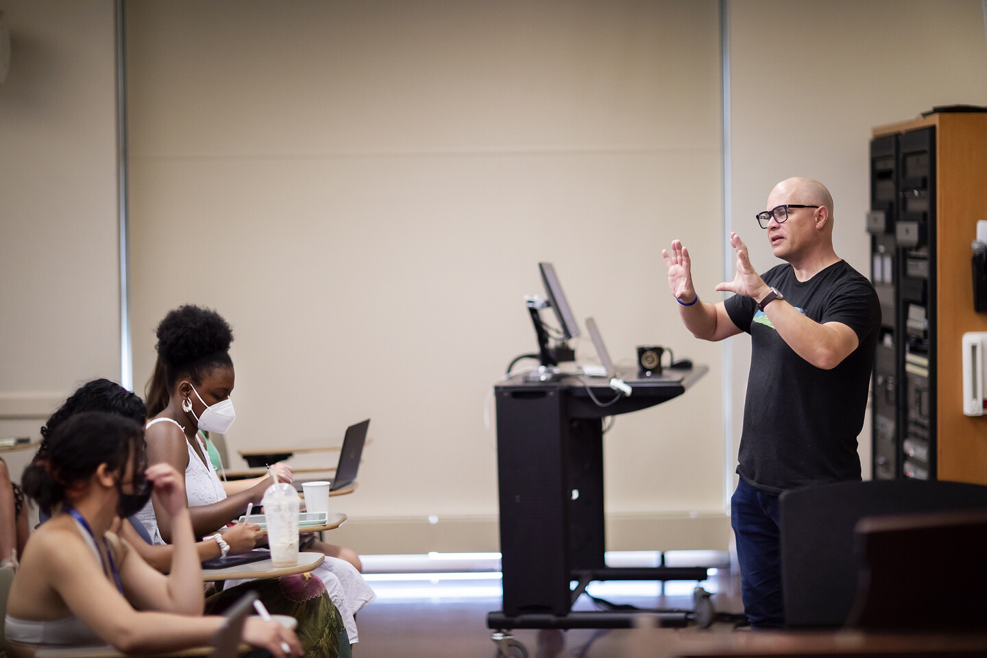 Timothy Rommen addresses students