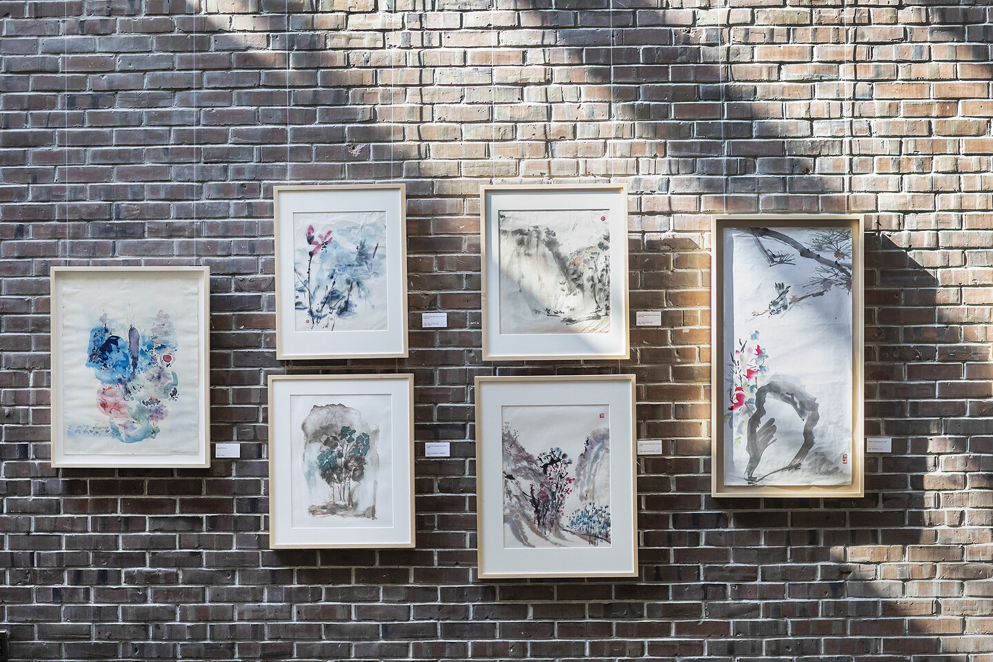 Artworks on brick wall