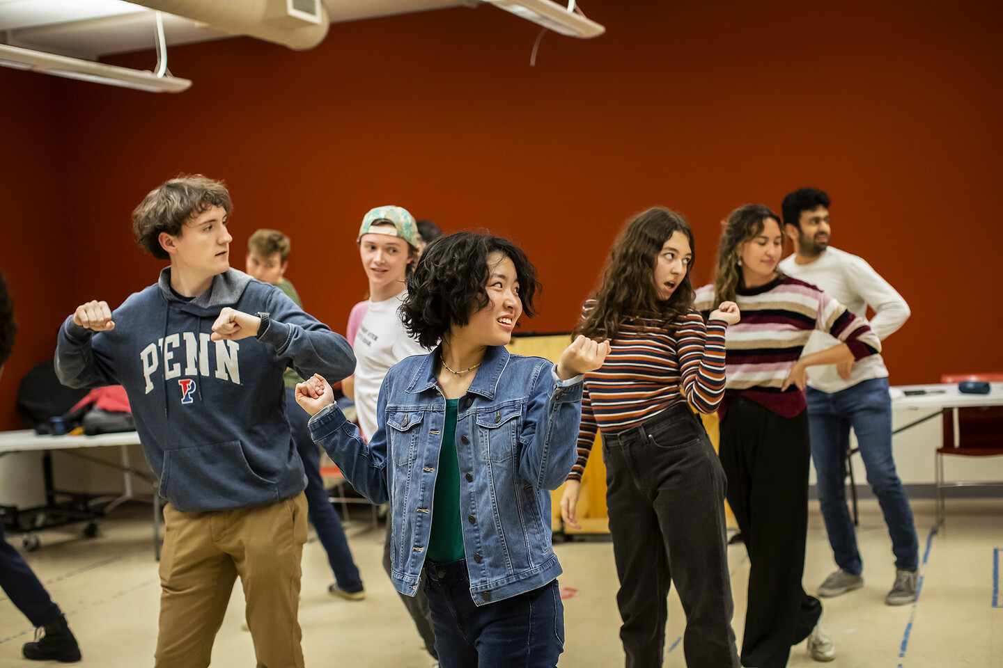 six students in two lines dancing