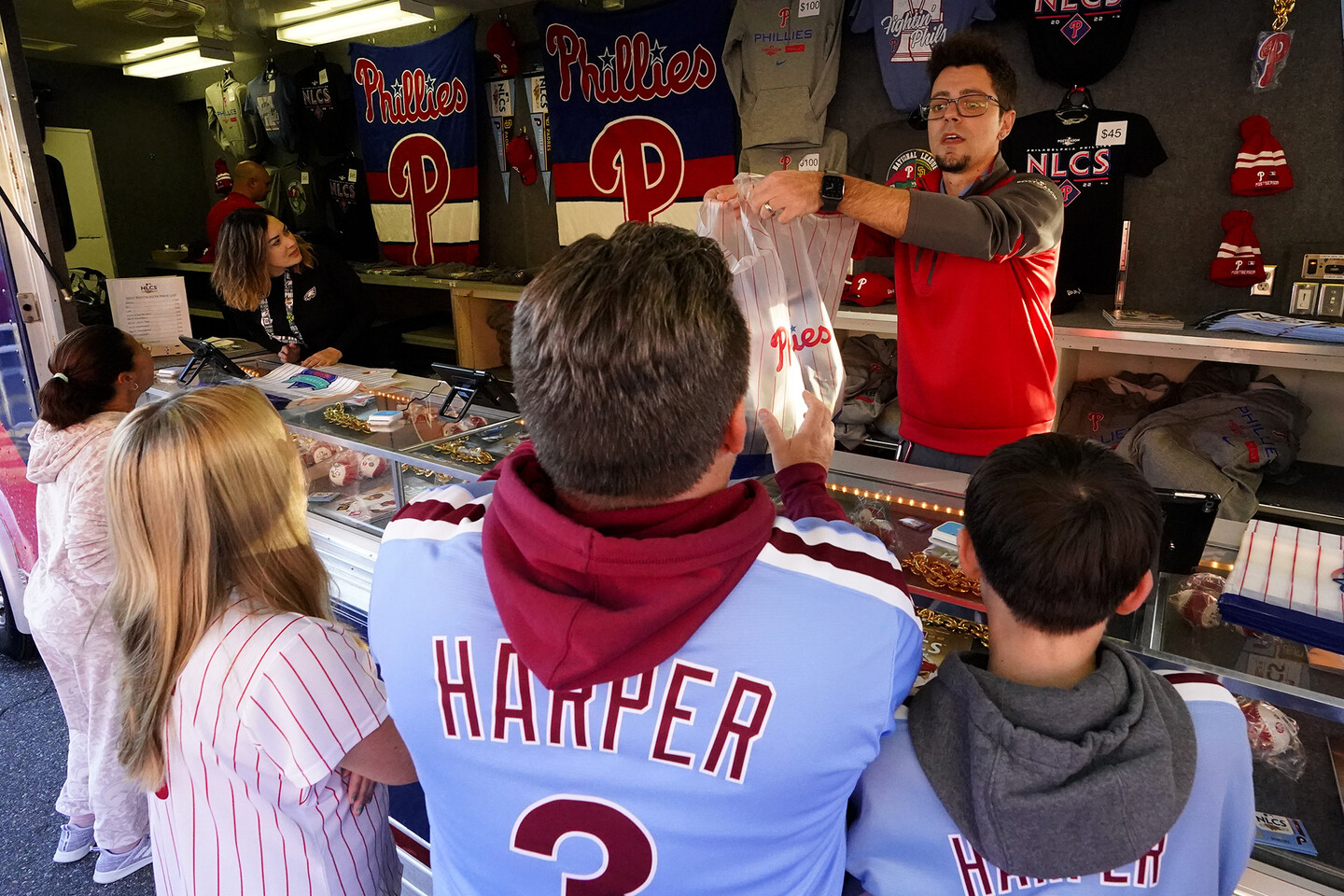 Sports fans buying memorabilia.