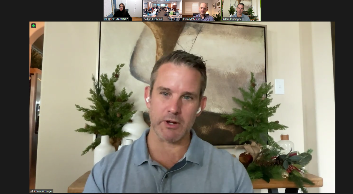 Former GOP Rep. Adam Kinzinger speaks to students via zoom.