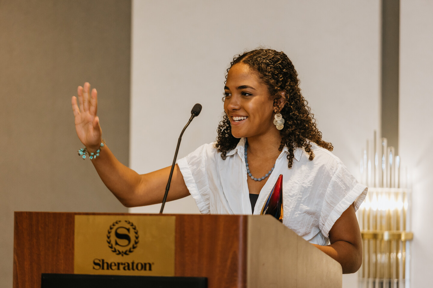 Mya Gordon at the podium