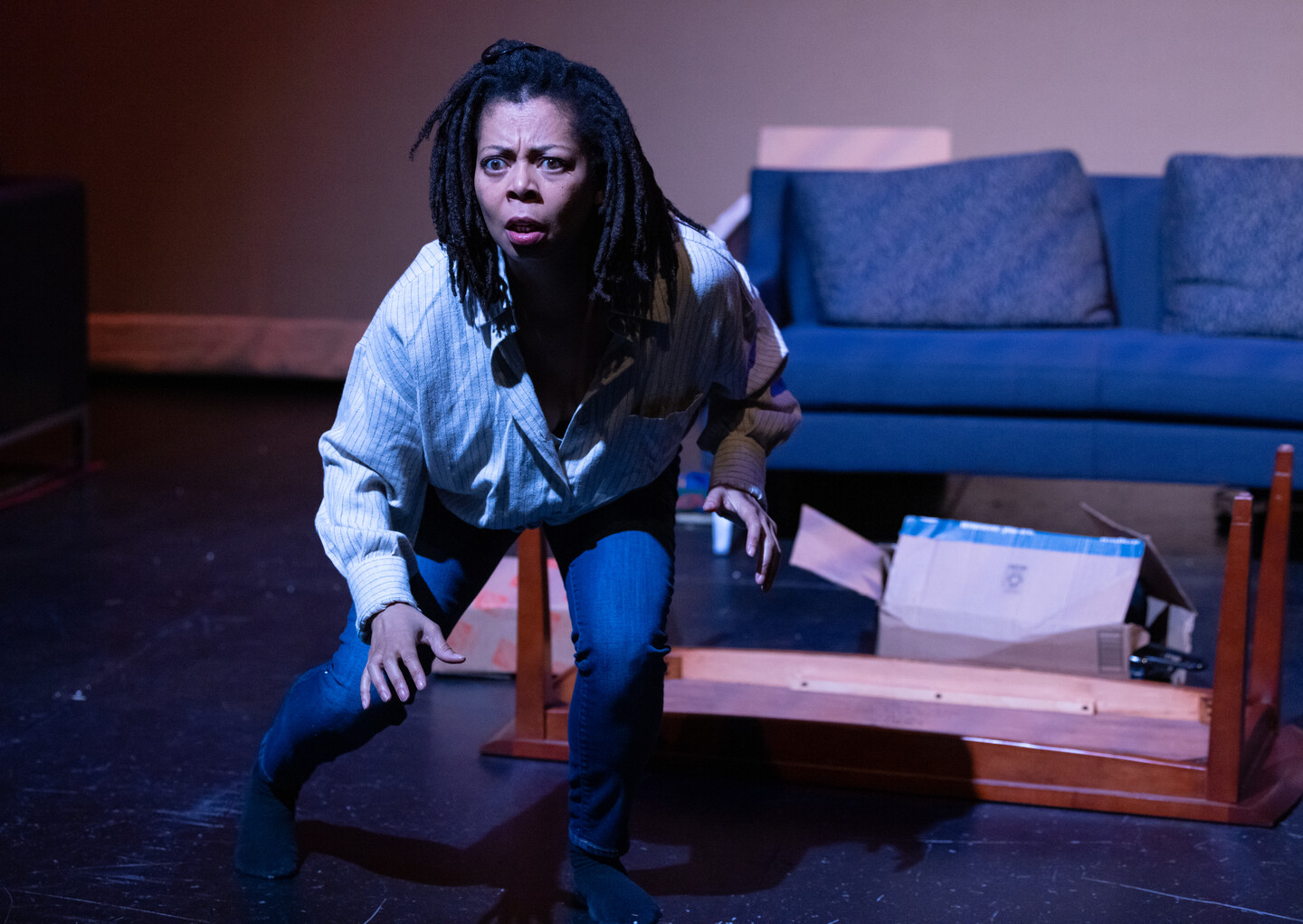 A person staring forward in shock. 