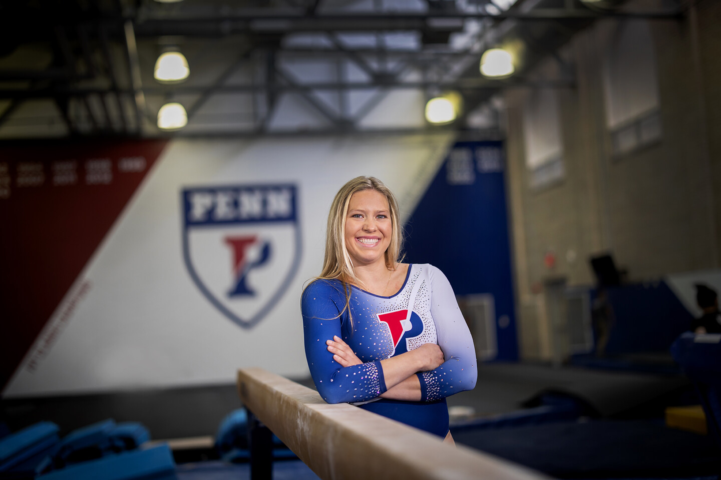 McCaleigh Marr poses inside the gymnastics practice facility 
