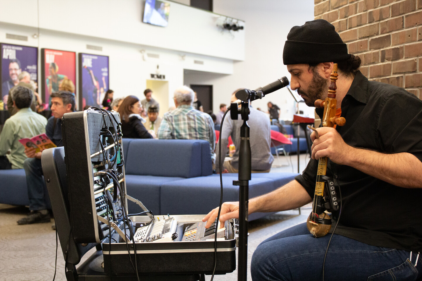 Person playing instruments.