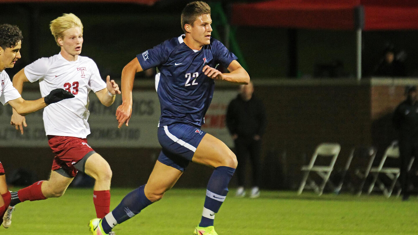 Stas Korzeniowski chases after the ball during a game against Temple.