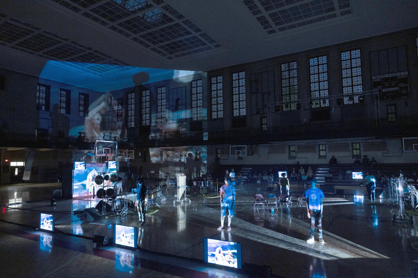 beholding performance in a gymnasium