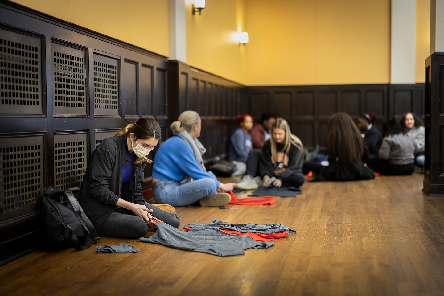 Alanna Ticali cuts a shirt to make into a bag on MLK Day