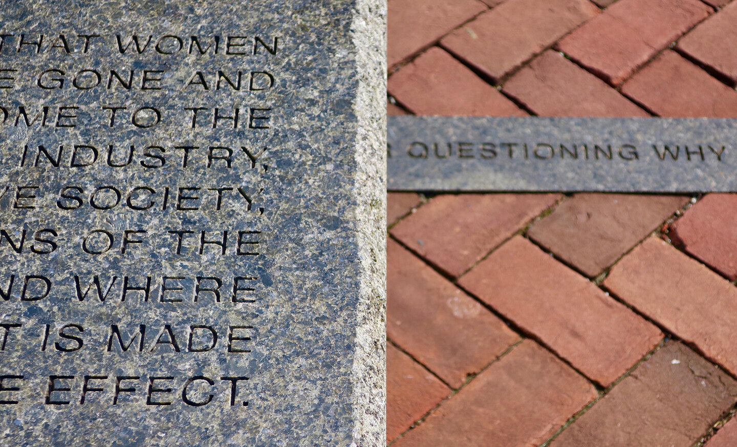 Partial view of a bench and walkway from Jenny Holzer’s 125 Years installation on Penn’s campus.