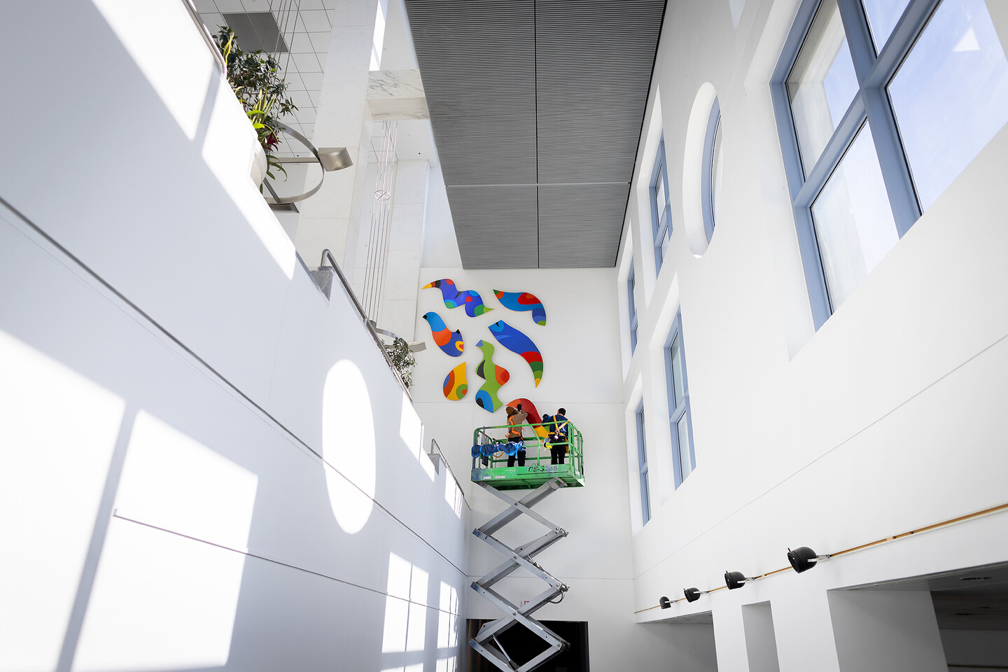 Atelier Art Services reinstalls Celebration mural.