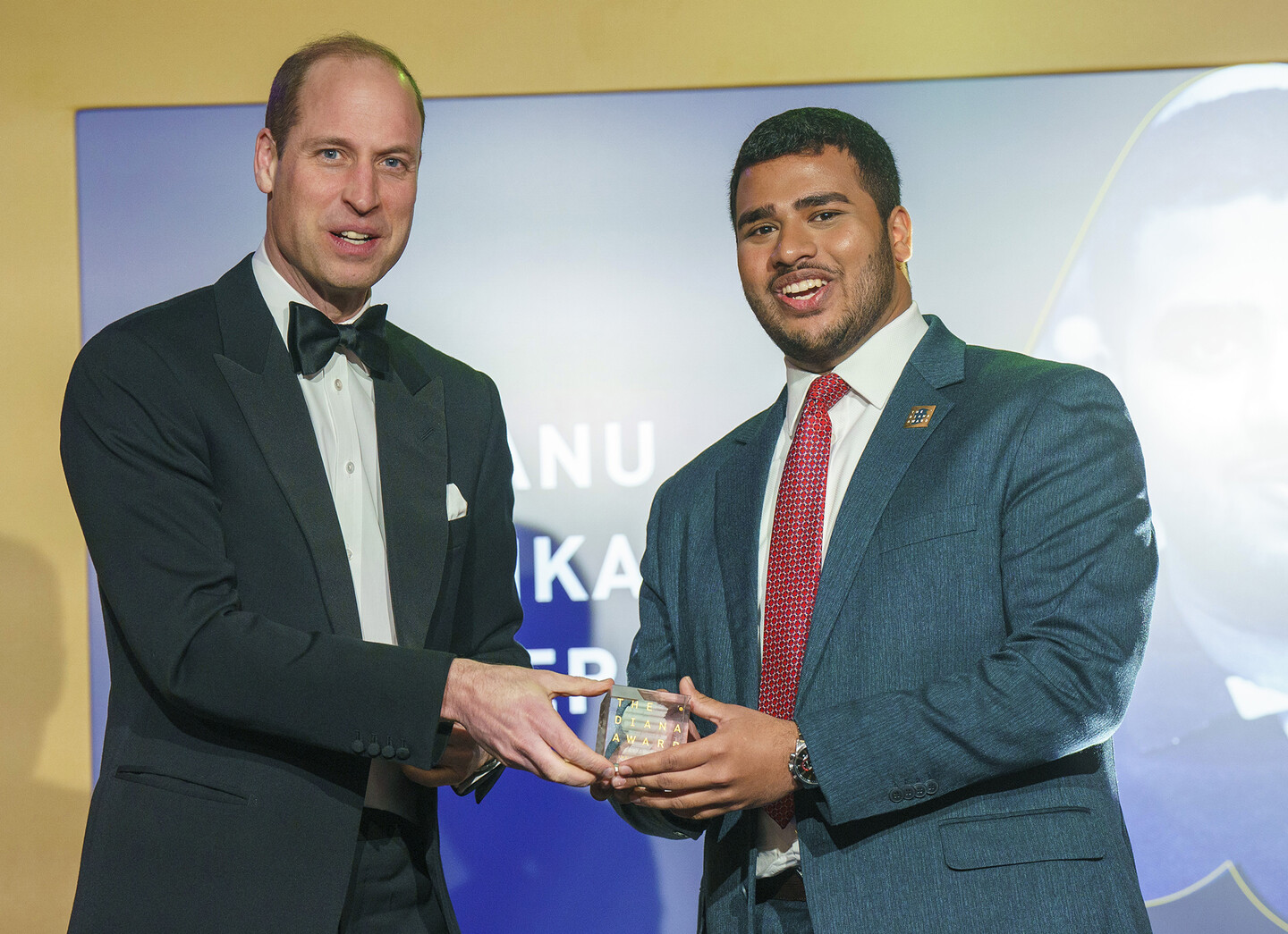 Prince William presenting an award to Gobhanu Sasankar Korisepati,