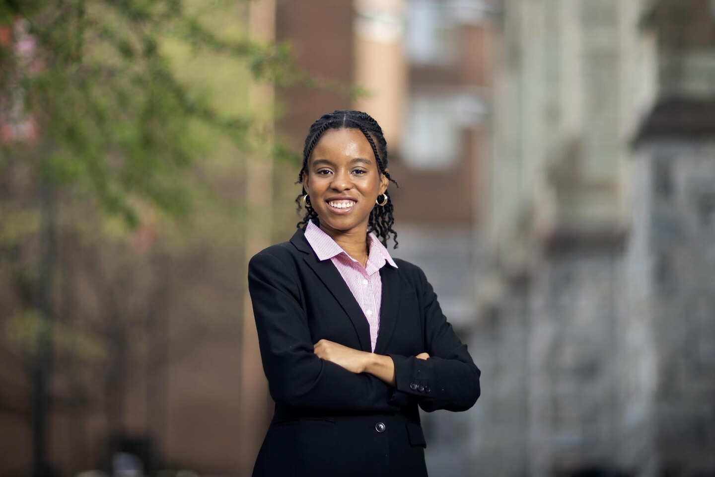 Imani Ardayfio standing outside arms crossed
