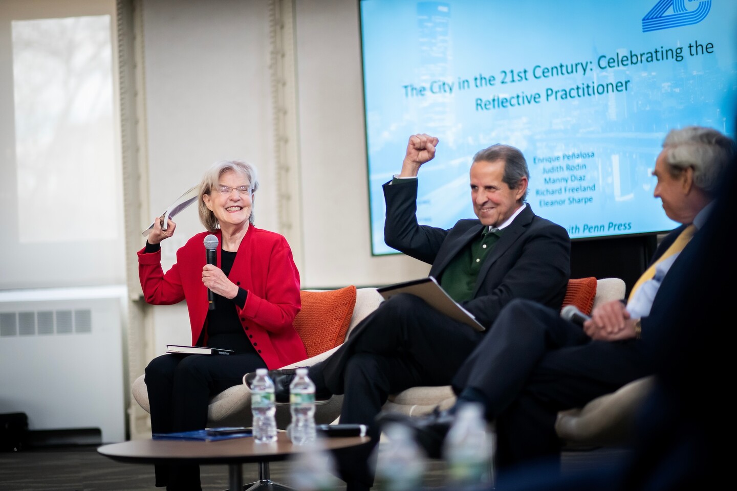 Susan Wachter and Manny Diaz seated at an event.