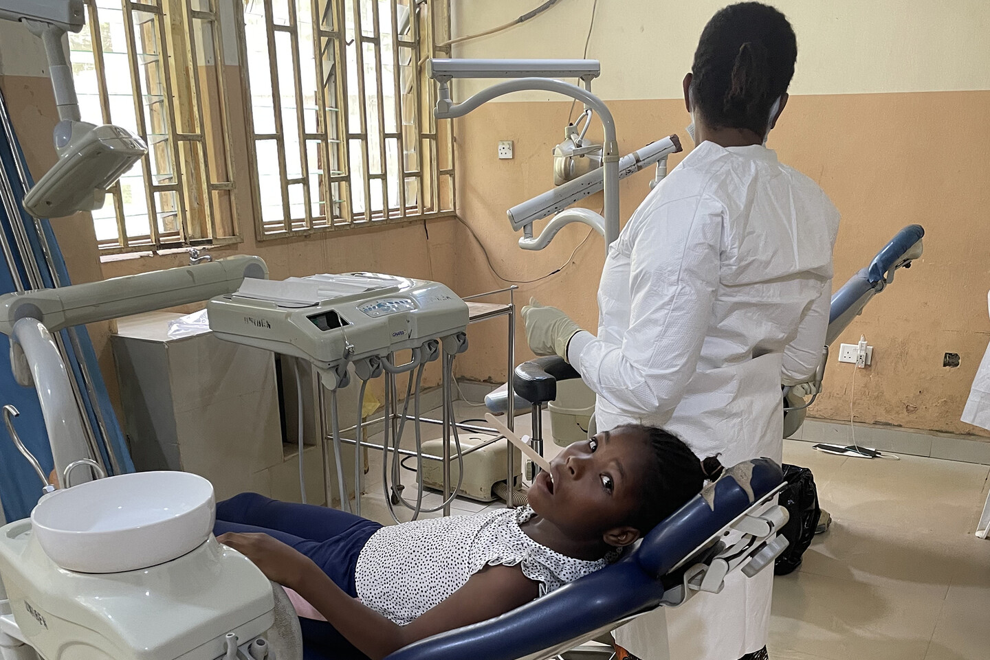 A child at a dentist’s office.