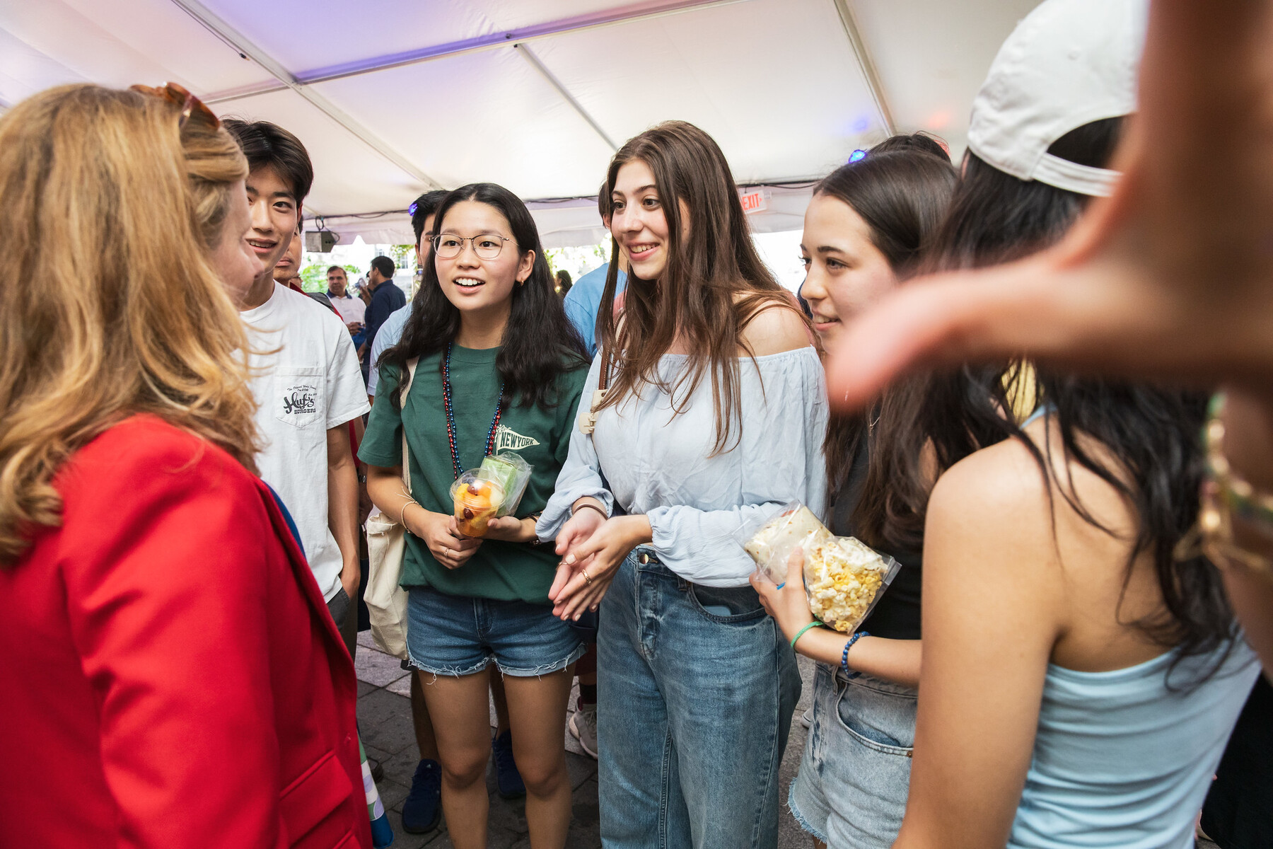 Several students talk to Penn President Liz Magill.