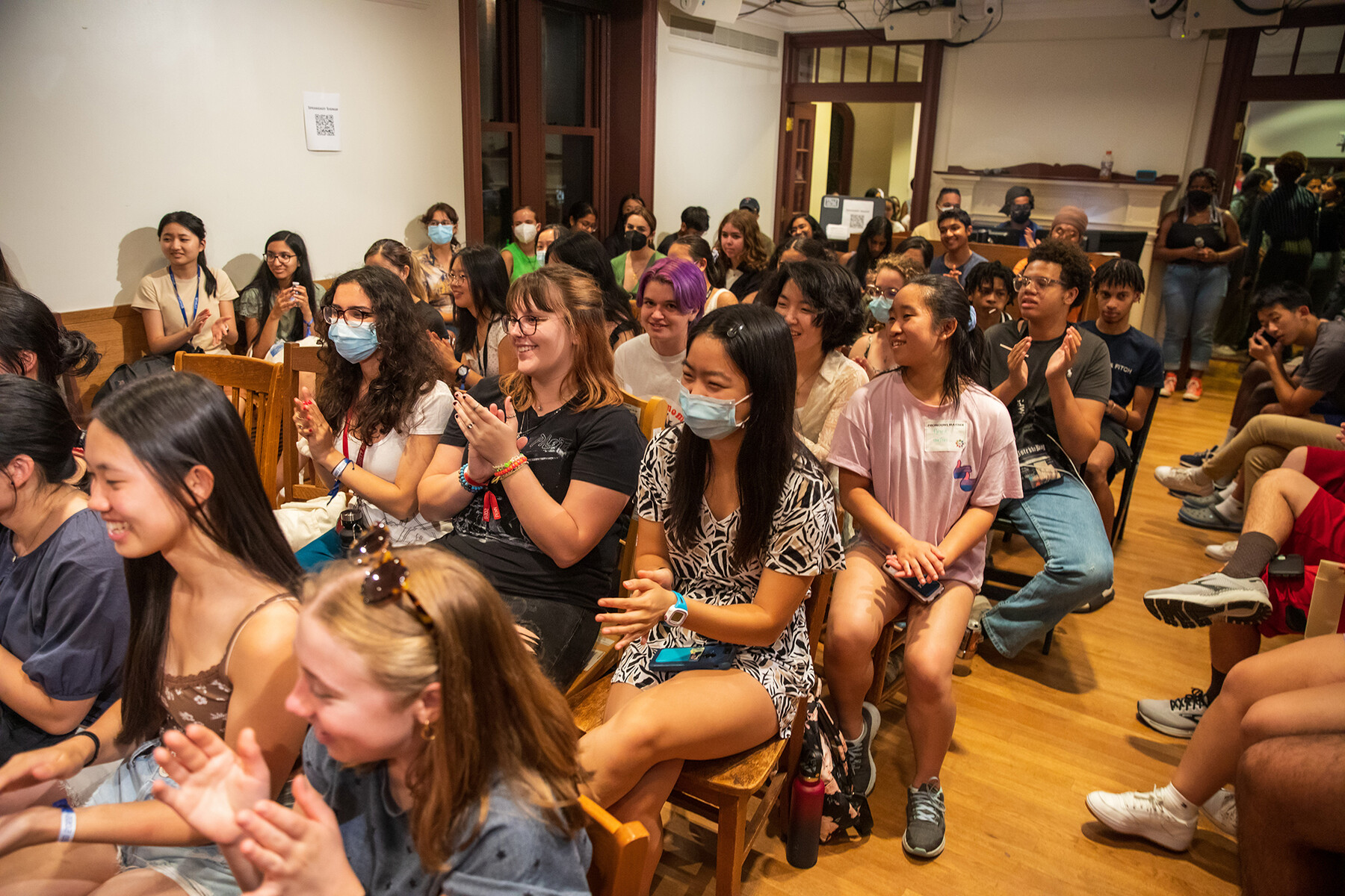 A group of new students at Kelly Writers House at a Speakeasy event.