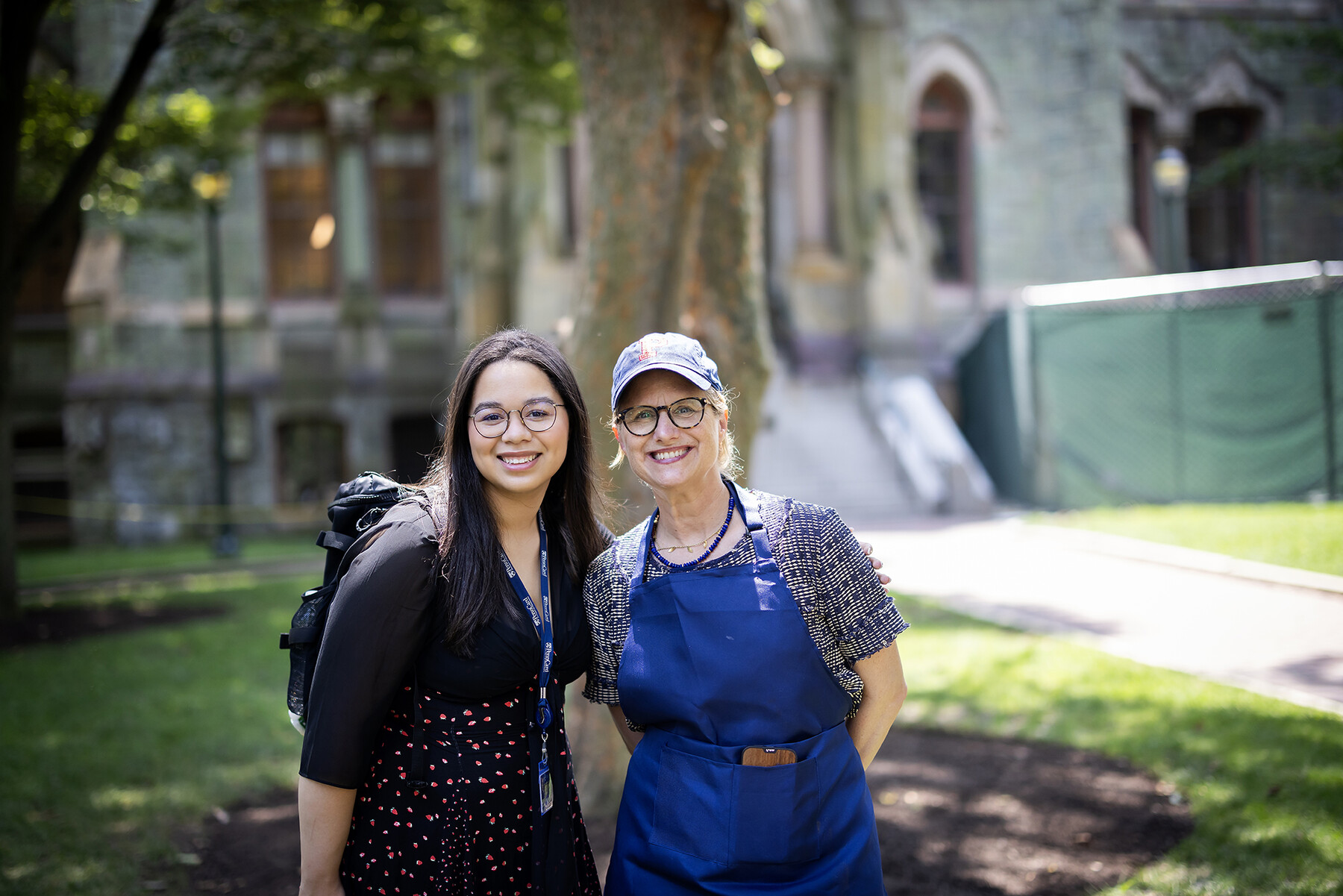 Liz Magill and and a student College Green.