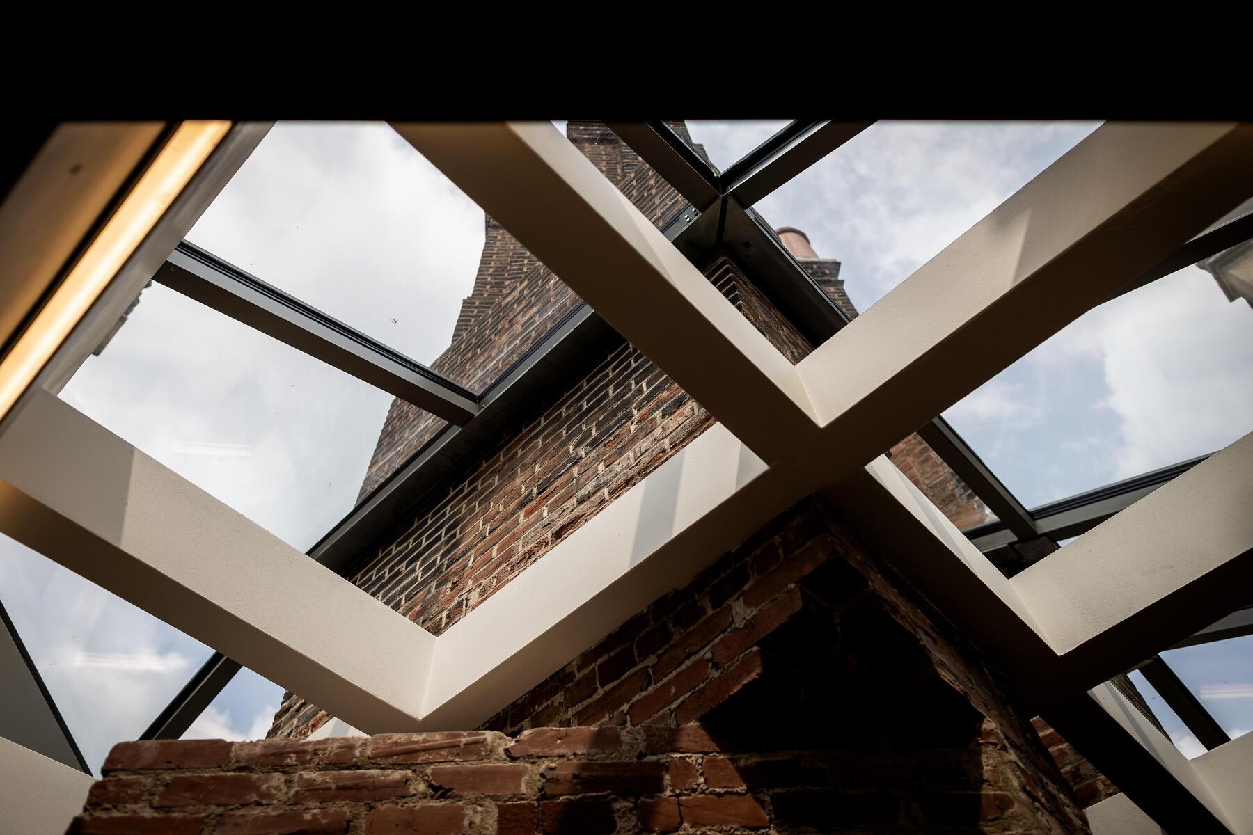 The bright interior of a brick area in a dorm in the Quadrangle.