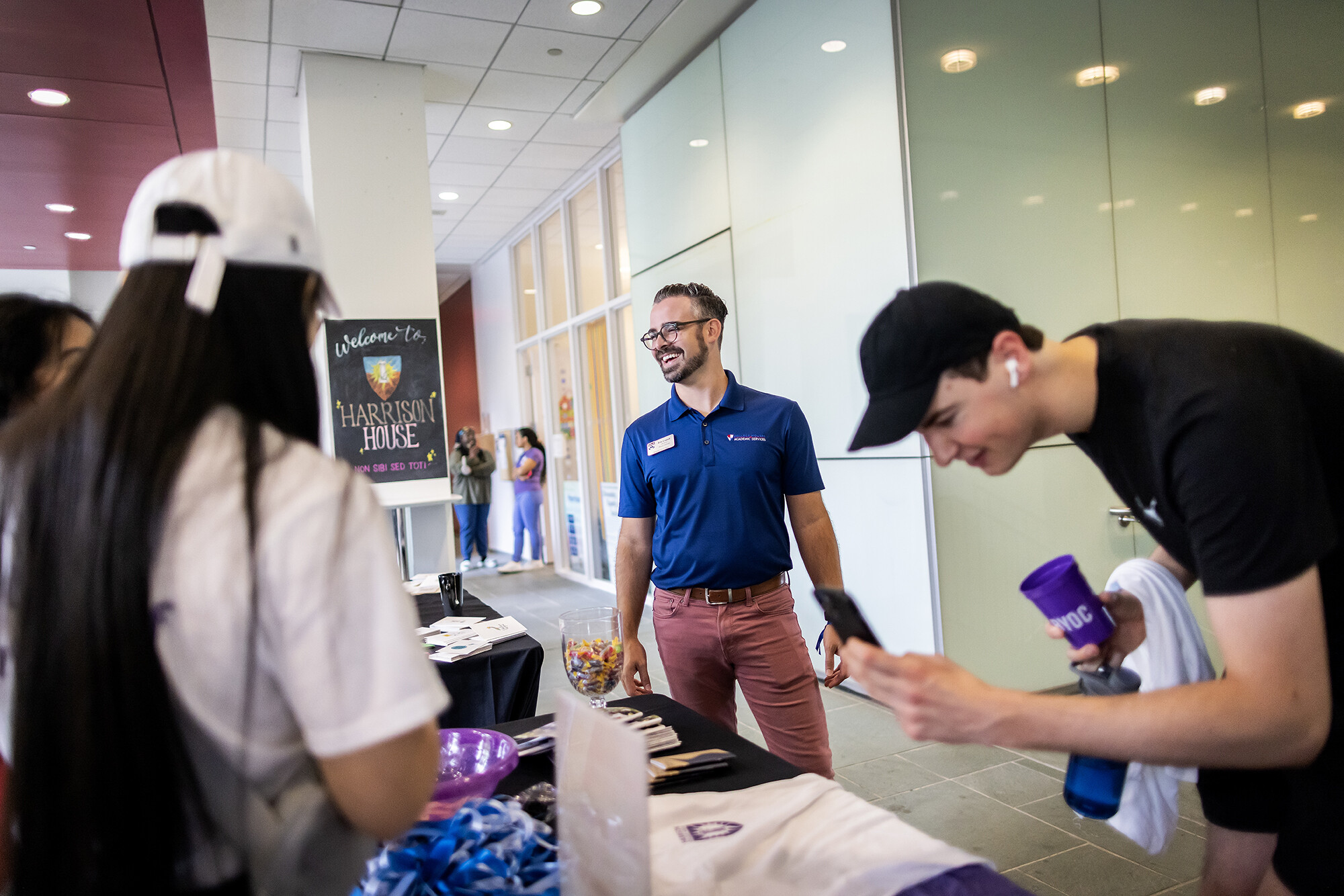 eric cottrell at a table with students