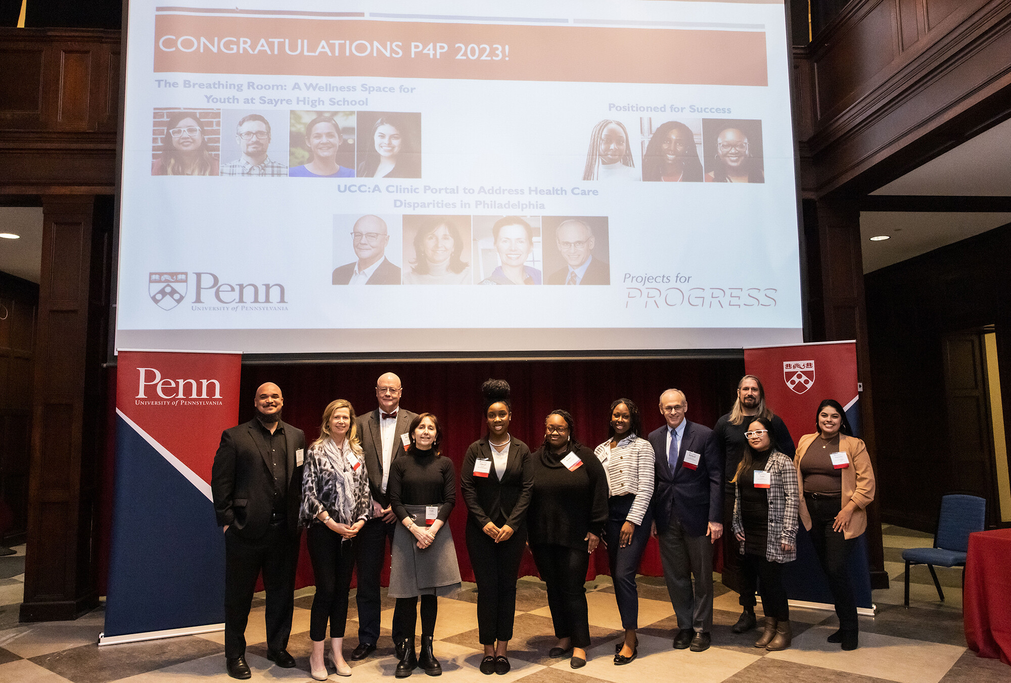 Chaz Howard stands with the recipients of the 2023 Projects for Progress awards.